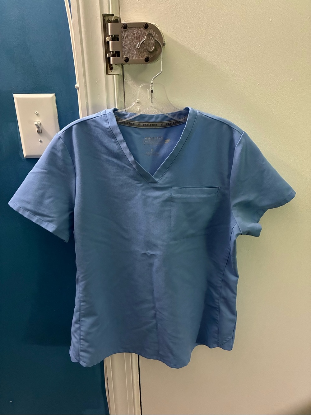 Fabletics Women's M light blue scrub set with pockets.